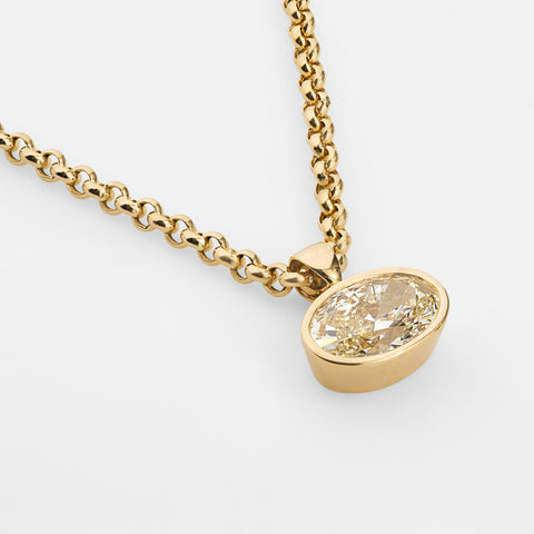 Statement golden oval diamond pendant